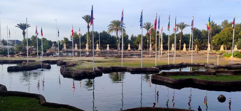 Flags around the lake of Parque De Las Naciones, Torrevieja